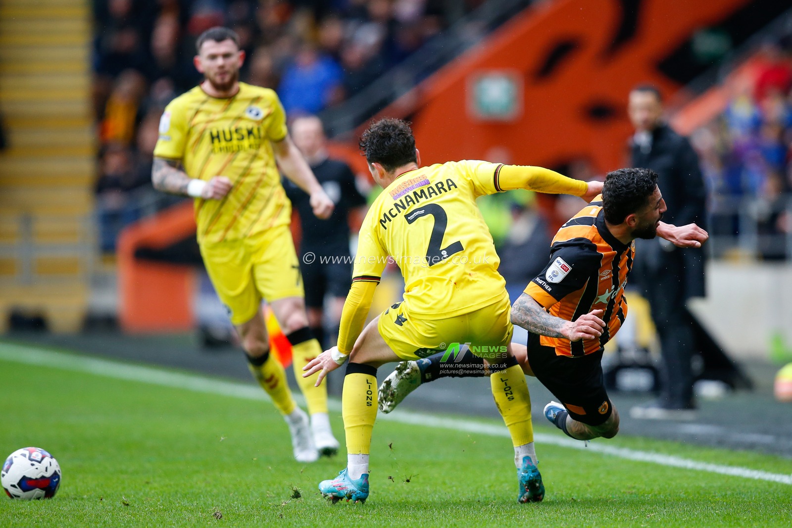 Danny McNamara #2 of Millwall fouls Allahyar Sayyadmanesh #9 of Hull City during the Sky Bet Championship match Hull City vs Millwall at MKM Stadium, Hull, United Kingdom, 10th April 2023

(Photo by Ben Early/News Images)