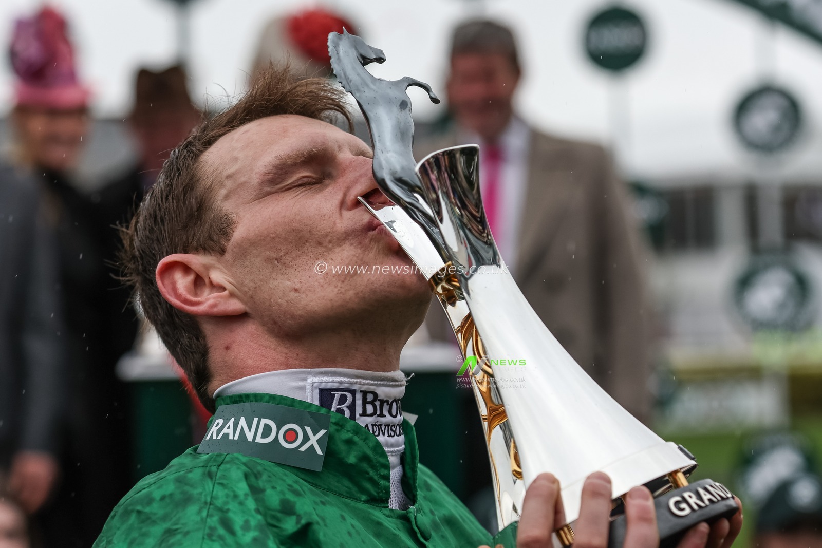 Paul Townend kisses the winners trophy as he wins the 16:00 Randox Grand National Handicap Chase on I Am Maximus during the Randox Grand National Day 2024 at Aintree Racecourse, Liverpool, United Kingdom, 13th April 2024

(Photo by Mark Cosgrove/News Images)