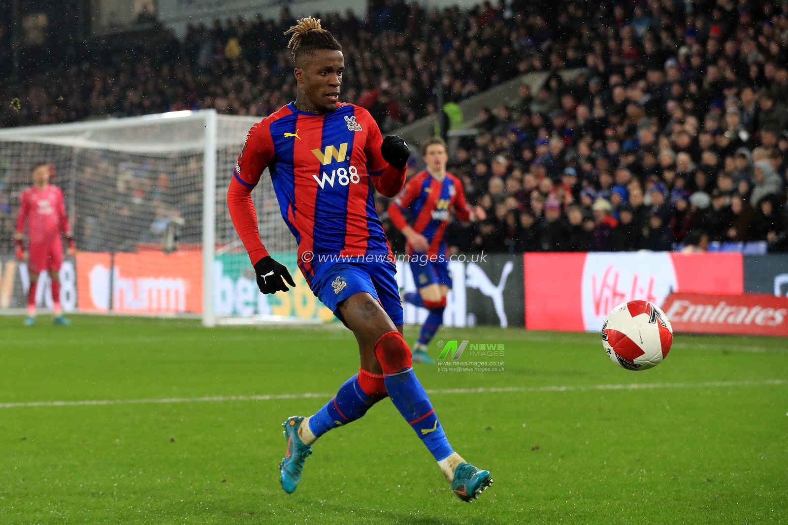 Wilfried Zaha #11 of Crystal Palace in action.