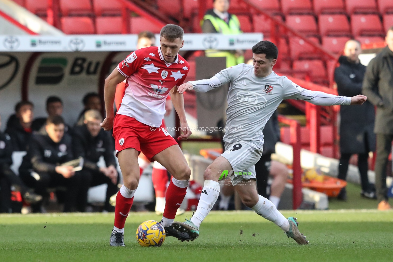 Jack Shepherd of Barnsley is tackled by Jack Aitchison of Exeter City during the Sky Bet League 1 match Barnsley vs Exeter City at Oakwell, Barnsley, United Kingdom, 27th January 2024

(Photo by Alfie Cosgrove/News Images)