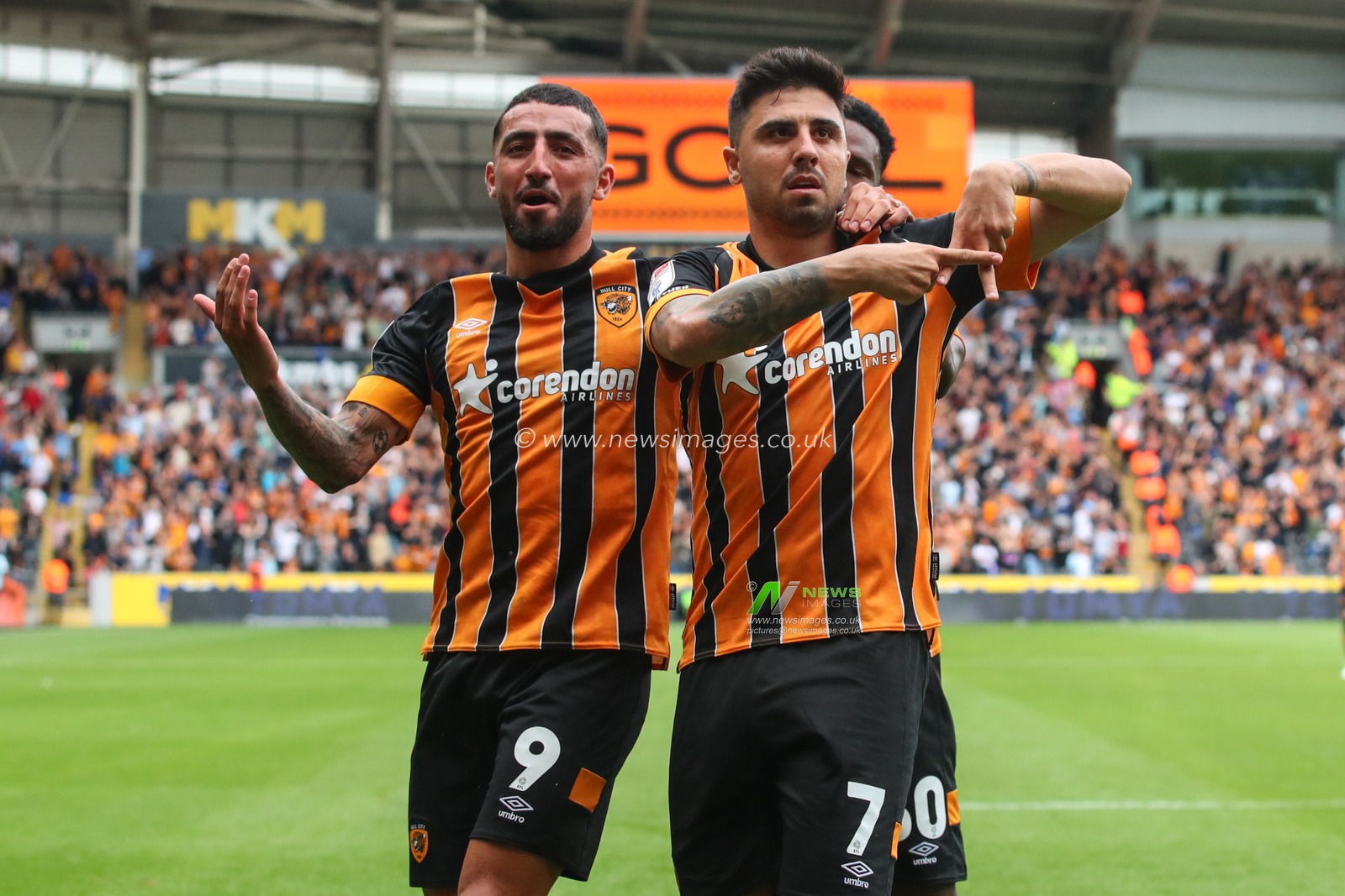 Ozan Tufan #7 of Hull City celebrates his goal to make it 1-1
