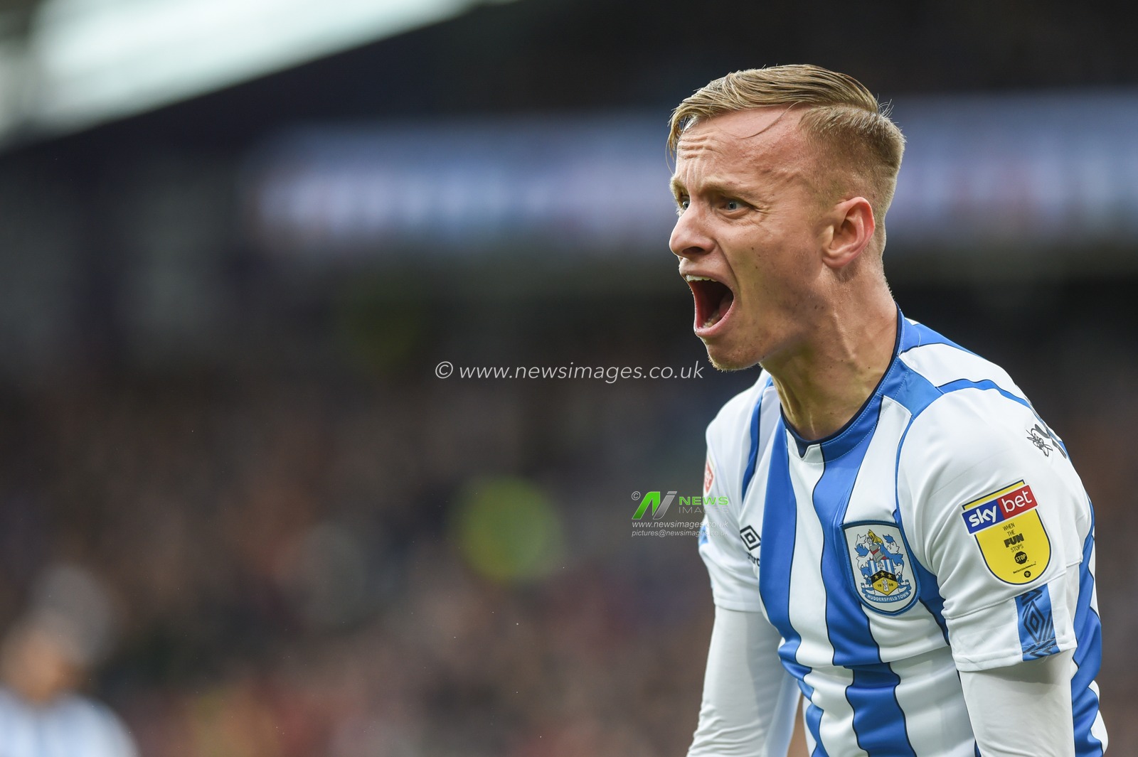 7th December 2019, John Smith's Stadium, Huddersfield, England; Sky Bet Championship, Huddersfield Town v Leeds United :Florent Hadergjonaj (33) of Huddersfield Town questions the linesman.

Credit: Dean Williams/News Images