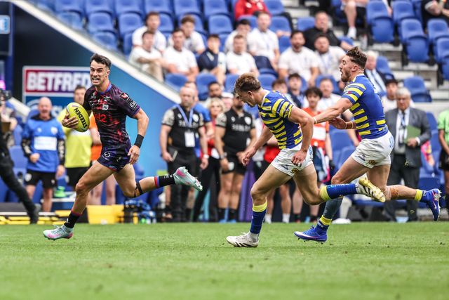 David Armstrong of Leigh Leopards breaks away with the ball to score a solo try during the Betfred Super League Magic Weekend match Leigh Leopards vs Warrington Wolves at Leigh Sports Village, Leigh, United Kingdom on 04 July 2026

(Photo by Alfie Cosgrove/News Images)