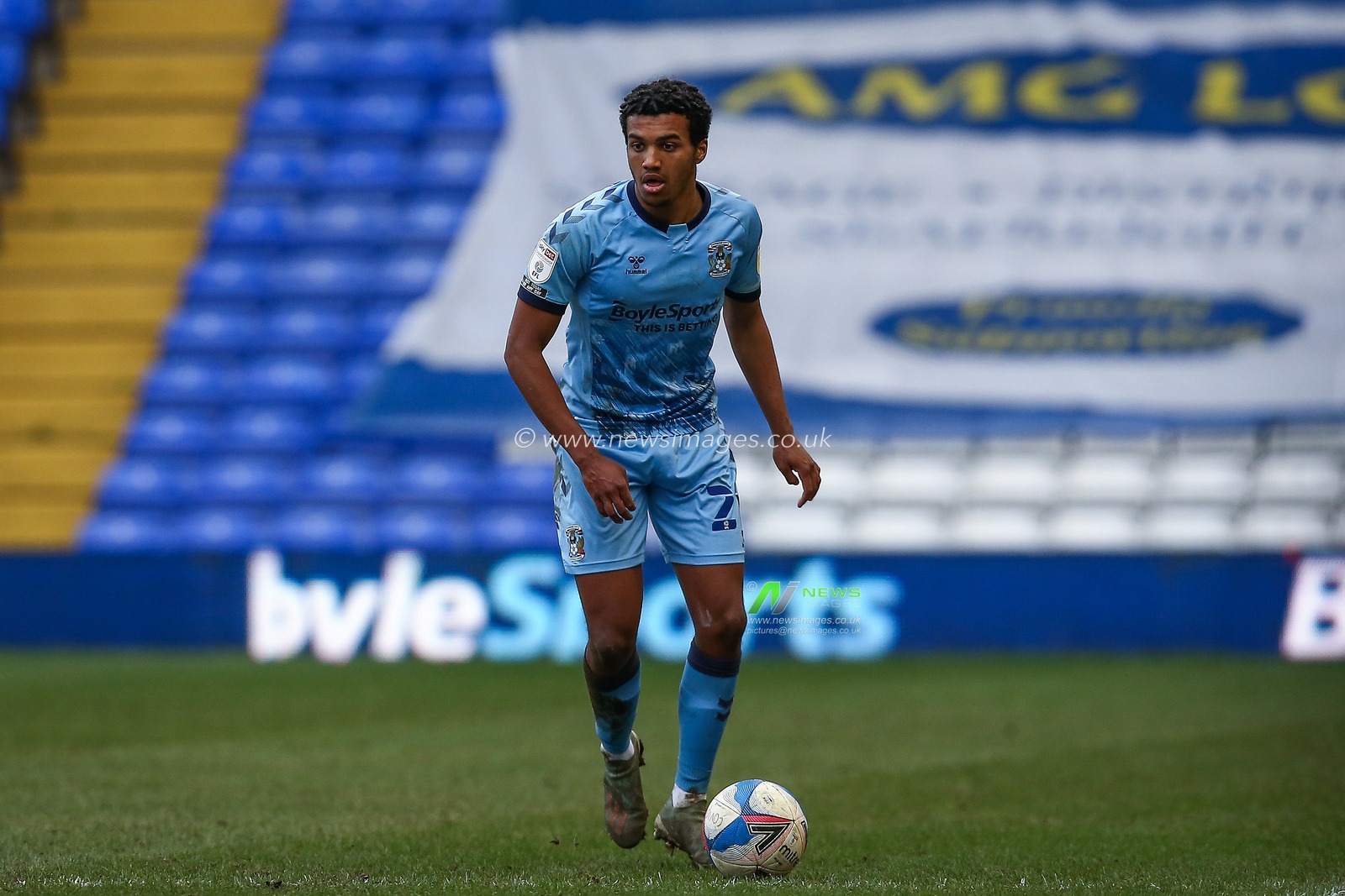 Sam McCallum #21 of Coventry City dribbles the ball