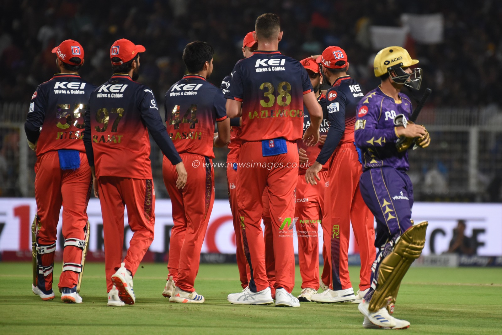 Royal Challengers Bengaluru's Josh Hazlewood, Center, celebrates with teammates after the dismissal of Kolkata Knight Riders' Quinton de Kock during the Indian Premier League cricket match between Kolkata Knight Riders and Royal Challengers Bengaluru at Eden Gardens in Kolkata, India, Saturday, March 22, 2025.Pictures by Debajyoti Chakraborty.(Photo: Debajyoti Chakraborty/News Images)
