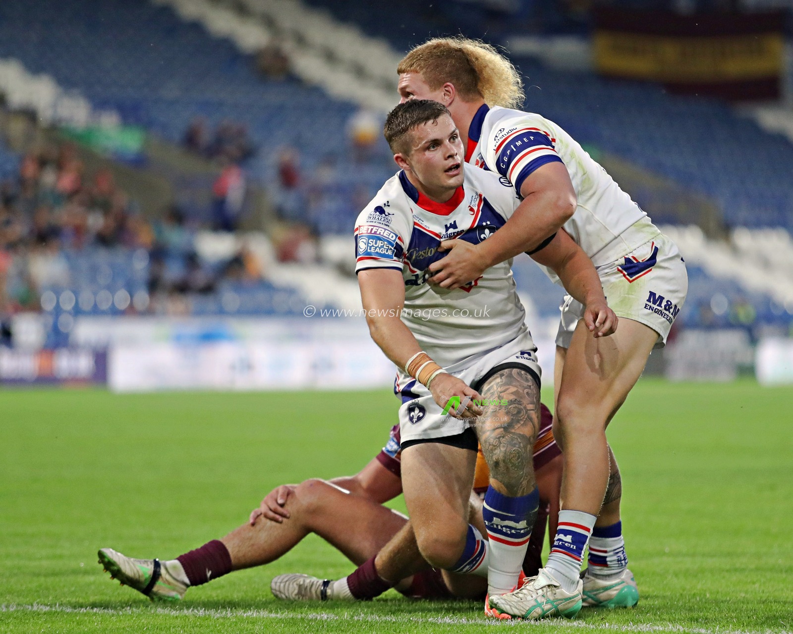 Cameron Scott of Wakefield Trinity celebrates scoring a try during the Betfred Super League round 19 match Huddersfield Giants vs Wakefield Trinity at the Accu Stadium, Huddersfield, United Kingdom, 18th July 2025(Photo by Sam Eaden/News Images)