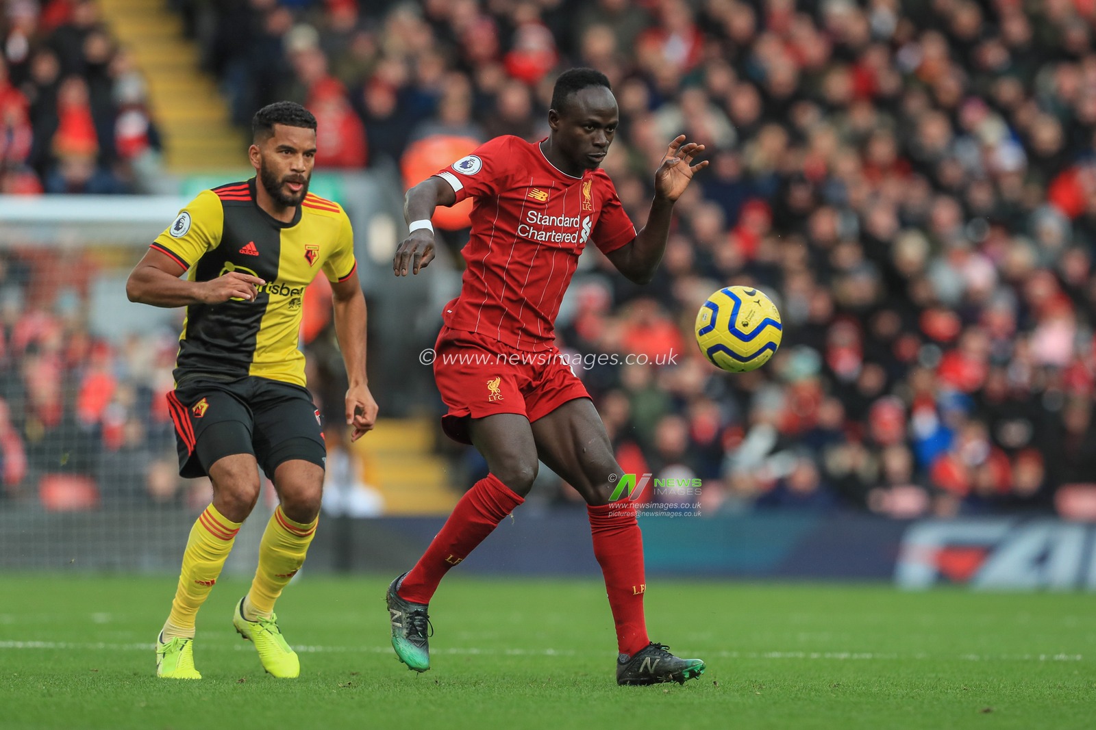 14th December 2019, Anfield, Liverpool, England; Premier League, Liverpool v Watford :  Sadio Mane (10) of Liverpool controls the ball 

Credit: Mark Cosgrove/News Images