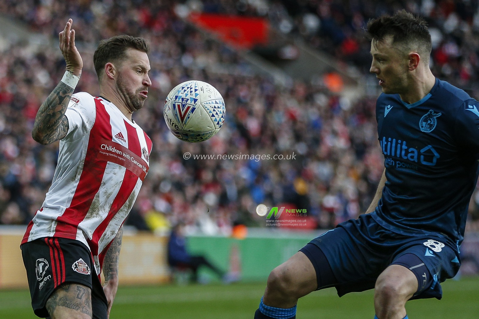 22nd February 2020, Stadium Of Light, Sunderland, England; Sky Bet League 1, Sunderland v Bristol Rovers : Chris Maguire (7) of Sunderland under pressure from Ollie Clarke (8) of Bristol Rovers