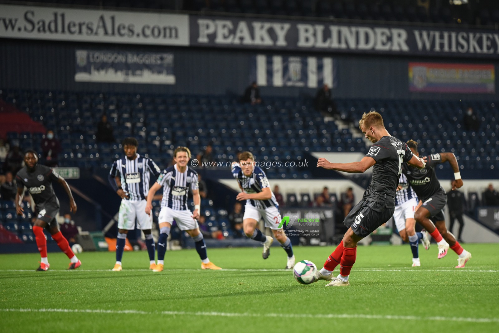 Marcus Forss (15) of Brentford scores a penalty to make it 2-2