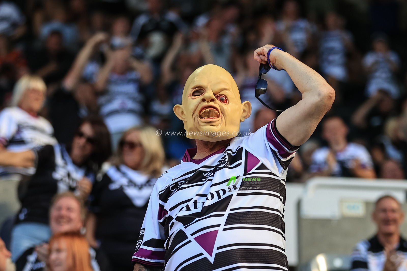 Hull FC fans celebrate Joe Lovodua #14 of Hull FCâ€™ try