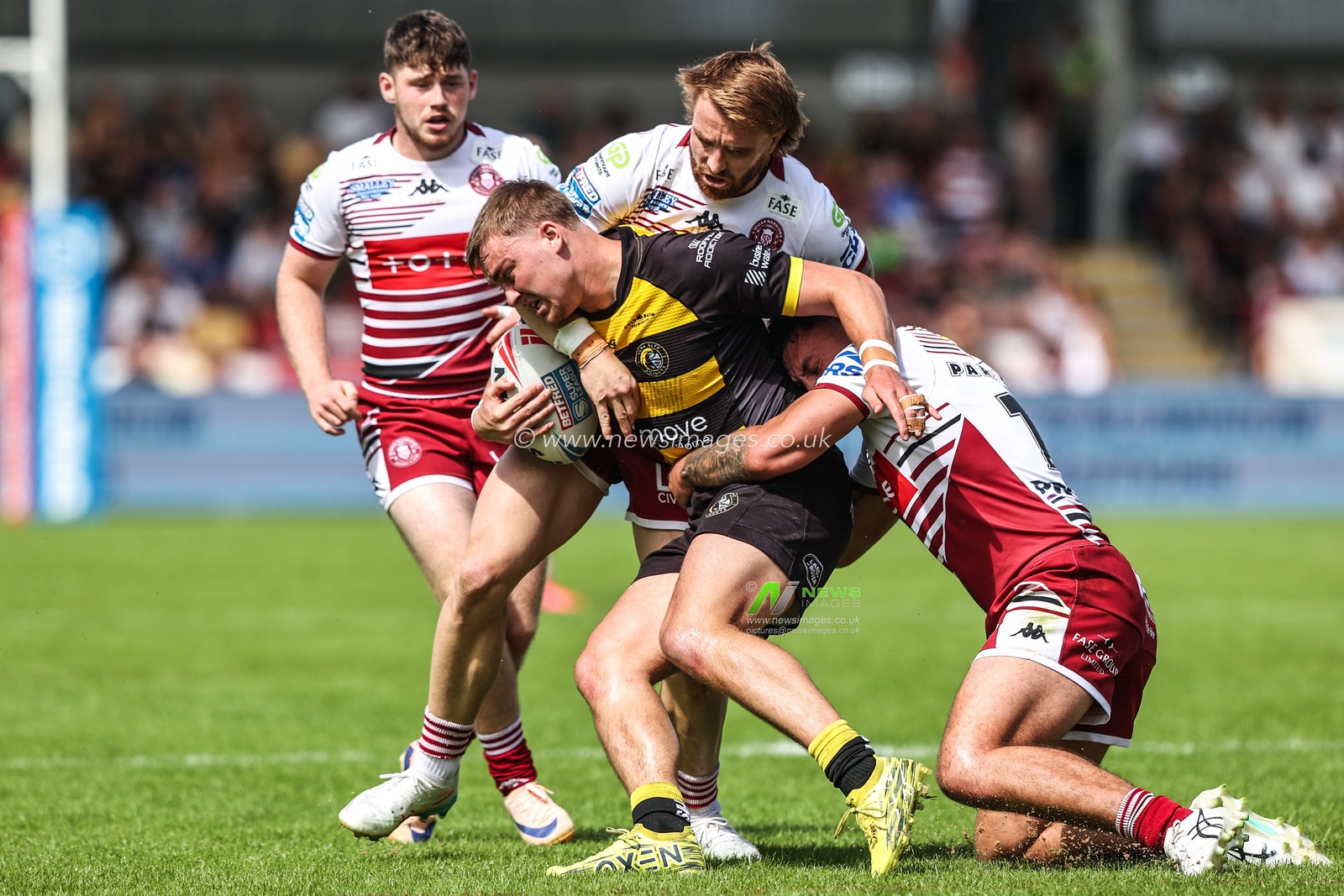 Oli Field of York Knights is tackled by Adam Keighran of Wigan Warriors during the Betfred Super League round 15 match York Knights vs Wigan Warriors at LNER Community Stadium, York, United Kingdom on 20 June 2026

(Photo by Alfie Cosgrove/News Images)