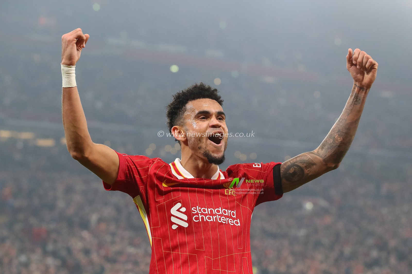 Luis DÃ­az of Liverpool celebrates his hat-trick goal to make it 4-0 during the UEFA Champions League, League Stage match Liverpool vs Bayer 04 Leverkusen at Anfield, Liverpool, United Kingdom, 5th November 2024

(Photo by Gareth Evans/News Images)