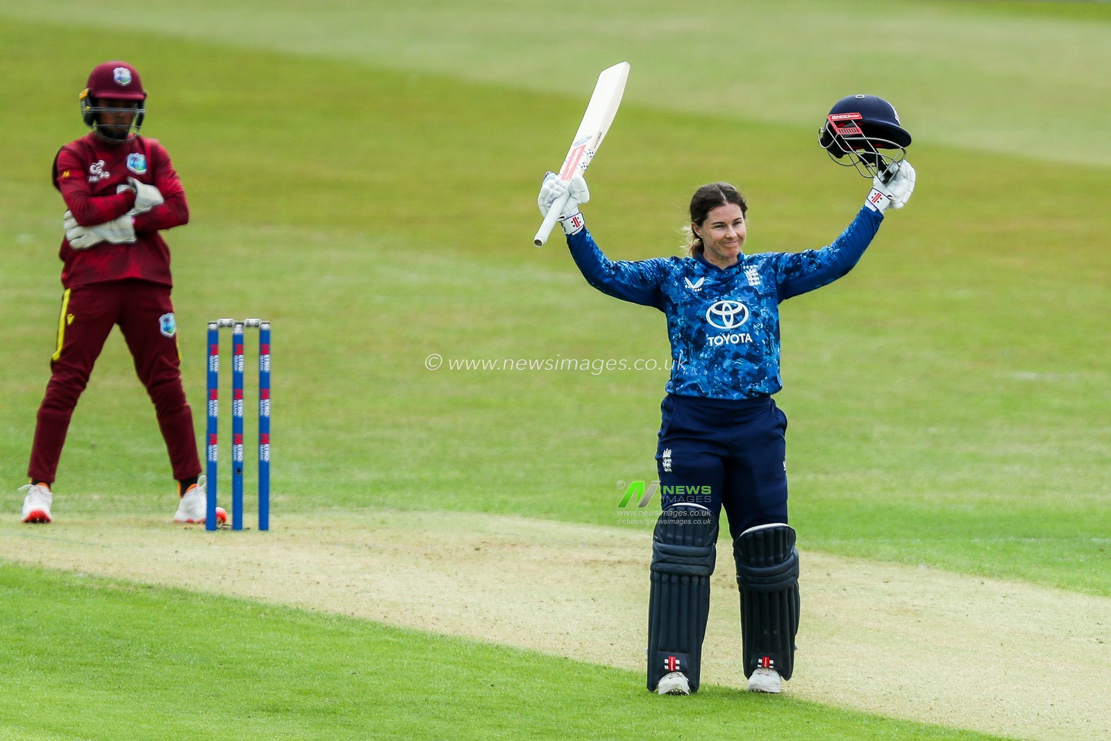 Tammy Beaumont of England Women celebrates a century during the 2nd Metro Bank ODI Day International England Women v West Indies Women at Uptonsteel County Ground, Leicester, United Kingdom, 4th June 2025

(Photo by Izzy Poles/News Images)