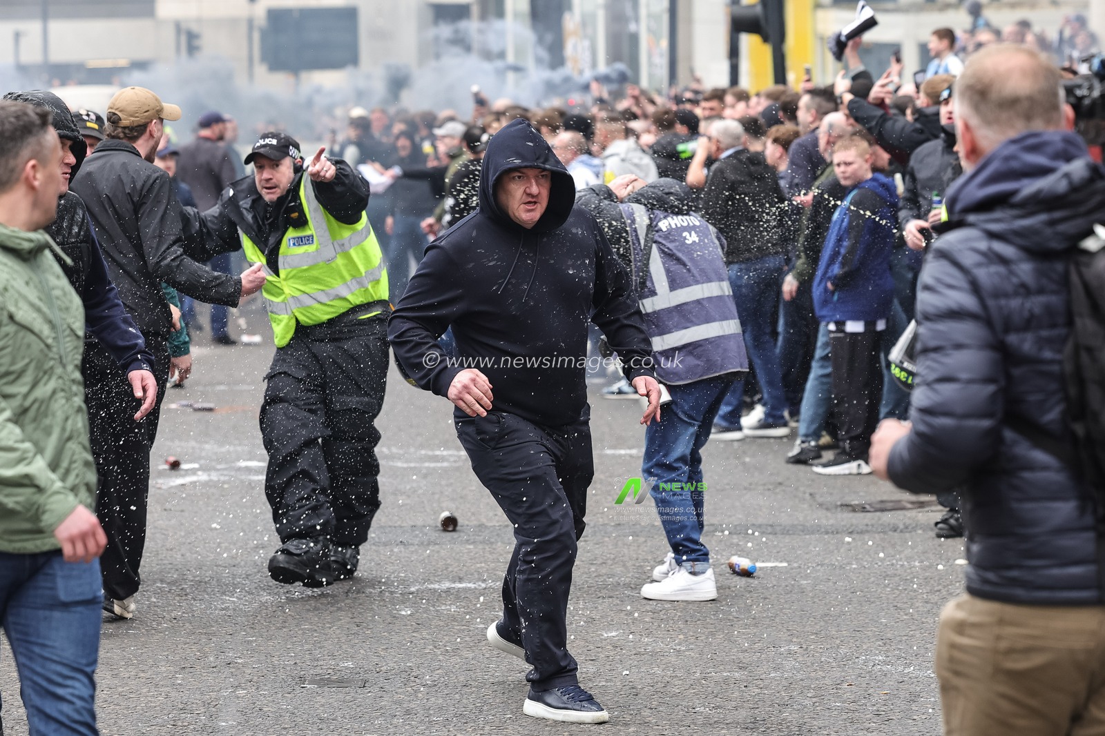 Police guide Sunderland fans through the Newcastle fans during the Premier League match Newcastle Untied vs Sunderland at St. James's Park, Newcastle, United Kingdom on 22 March 2026

(Photo by News Images)