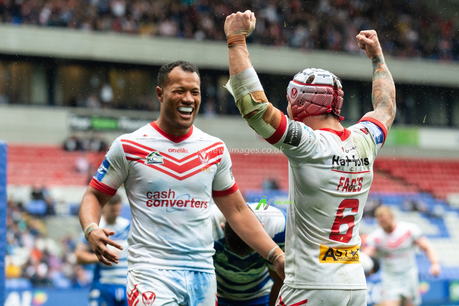 27th July 2019 , University of Bolton Stadium, Bolton, England; 2019 Coral Challenge Cup Semi-Final, St Helens vs Halifax RLFC ; Theo Fages of St Helens celebrates scoring his try with Joseph Paulo of St Helens 


Credit: Richard Long/News Images