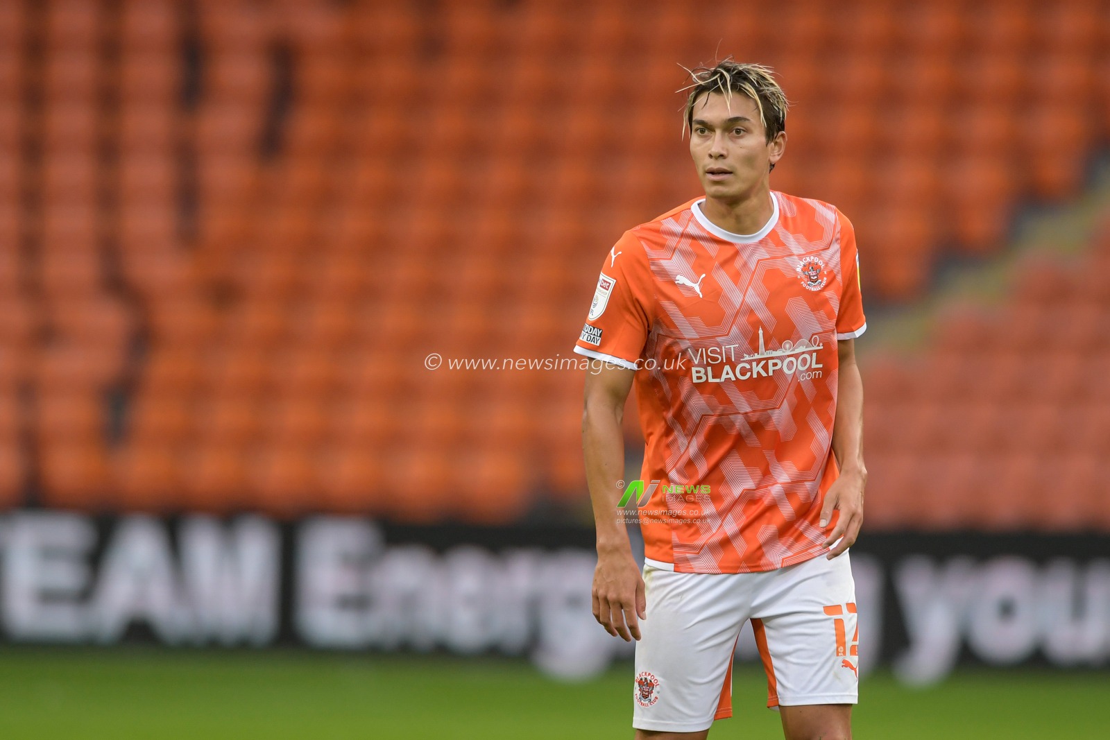 Kenny Dougall #12 of Blackpool in action during the game