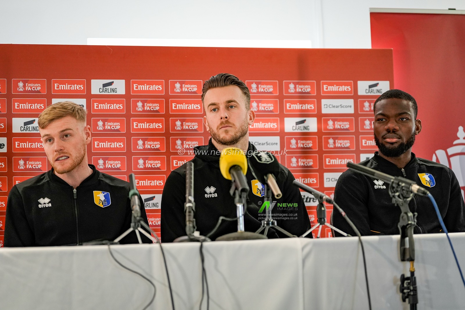 Will Evans, Rhys Oates and Deji Oshilaja all of Mansfield Town during the pre-match press conference for the FA Cup Fifth round match Mansfield v Arsenal to be played at One Call Stadium, Mansfield, United Kingdom on 07 March 2026

(Photo by Maynard Manyowa/News Images)
