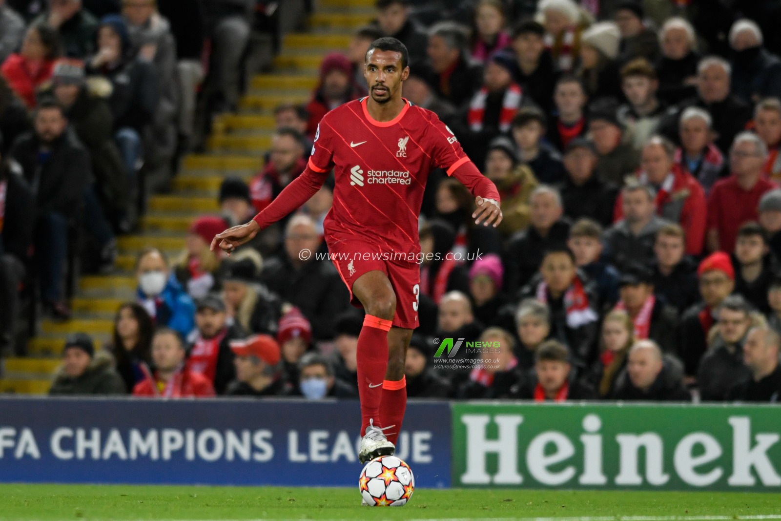 Joel Matip #32 of Liverpool with the ball