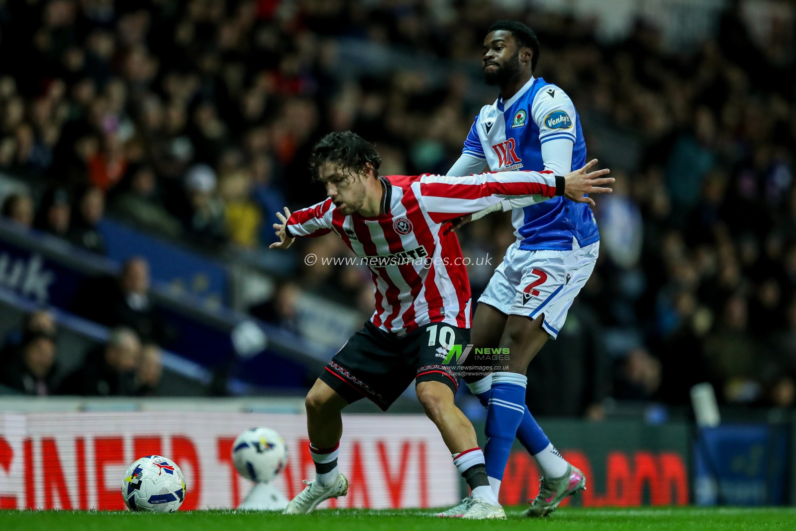 Callum O'Hare of Sheffield United tackles Ryan Alebiosu of Blackburn Rovers during the Sky Bet Championship match Blackburn Rovers vs Sheffield United at Ewood Park, Blackburn, United Kingdom, 21st October 2025

(Photo by Jorge Horsted/News Images)