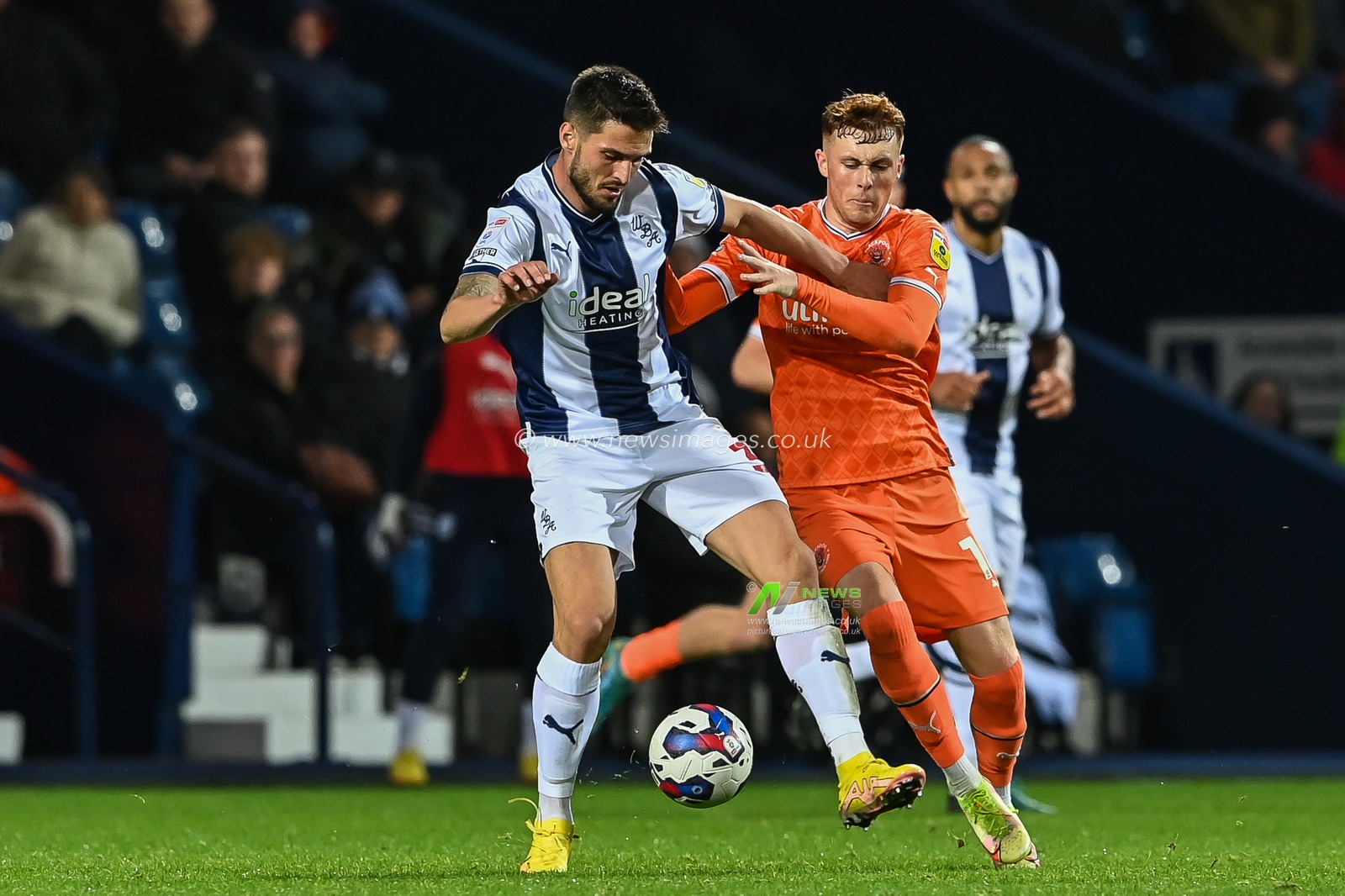 Sonny Carey #16 of Blackpool and Okay YokuÅŸlu #35 of West Bromwich Albion battle for the ball  during the Sky Bet Championship match West Bromwich Albion vs Blackpool at The Hawthorns, West Bromwich, United Kingdom, 1st November 2022

(Photo by Craig Thomas/News Images)