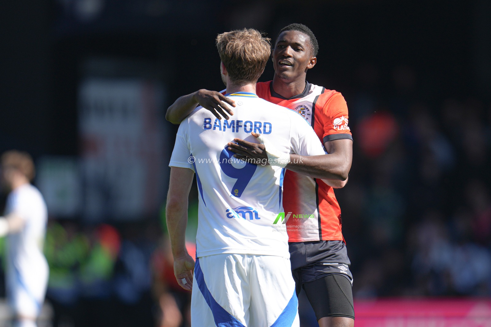 Christ Makosso of Luton Town with Patrick Bamford of Leeds United during the Sky Bet Championship match Luton Town vs Leeds United at Kenilworth Road, Luton, United Kingdom, 5th April 2025

(Photo by Harvey Murphy/News Images)