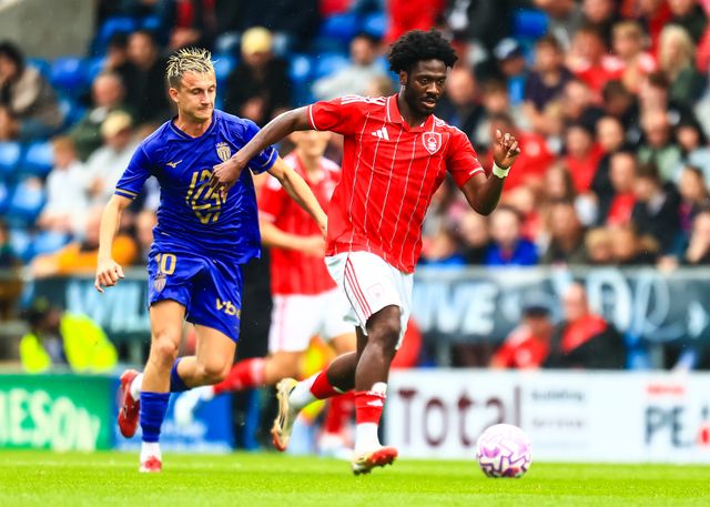 Aleksandr Golovin of Monaco pressures Ola Aina of Nottingham Forest during the Pre-season friendly match Nottingham Forest vs Monaco at SMH Group Stadiumact Stadium, Chesterfield, United Kingdom, 19th July 2025

(Photo by Richard Bierton/News Images)
