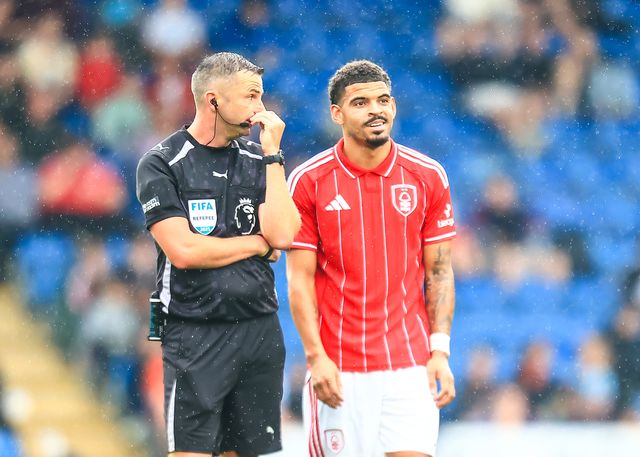 referee Michael Oliver and Morgan Gibbs-White of Nottingham Forest during the Pre-season friendly match Nottingham Forest vs Monaco at SMH Group Stadiumact Stadium, Chesterfield, United Kingdom, 19th July 2025

(Photo by Richard Bierton/News Images)