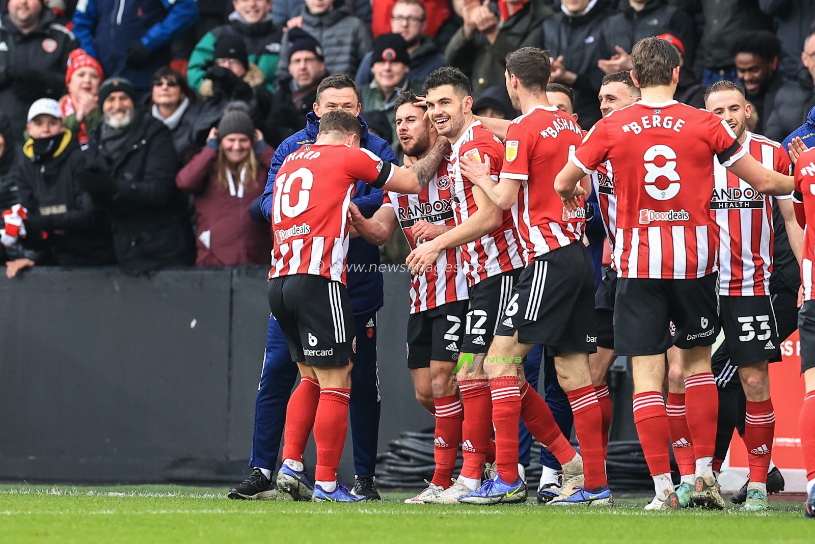 George Baldock #2 of Sheffield United celebrates his goal to make it 2-0 with Paul Heckingbottom manager of Sheffield United and the bench