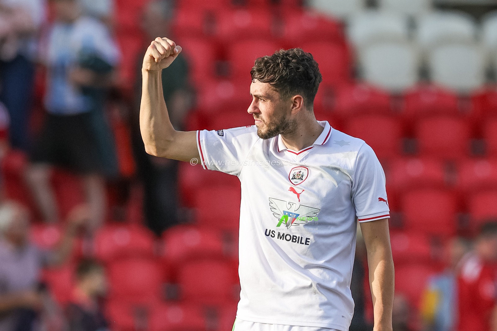 Corey O'Keeffe #22 of Barnsley applauds the traveling fans after Barnsley win 0-1during the Sky Bet League 1 match Exeter City vs Barnsley at St James' Park, Exeter, United Kingdom, 7th October 2023

(Photo by Mark Cosgrove/News Images)