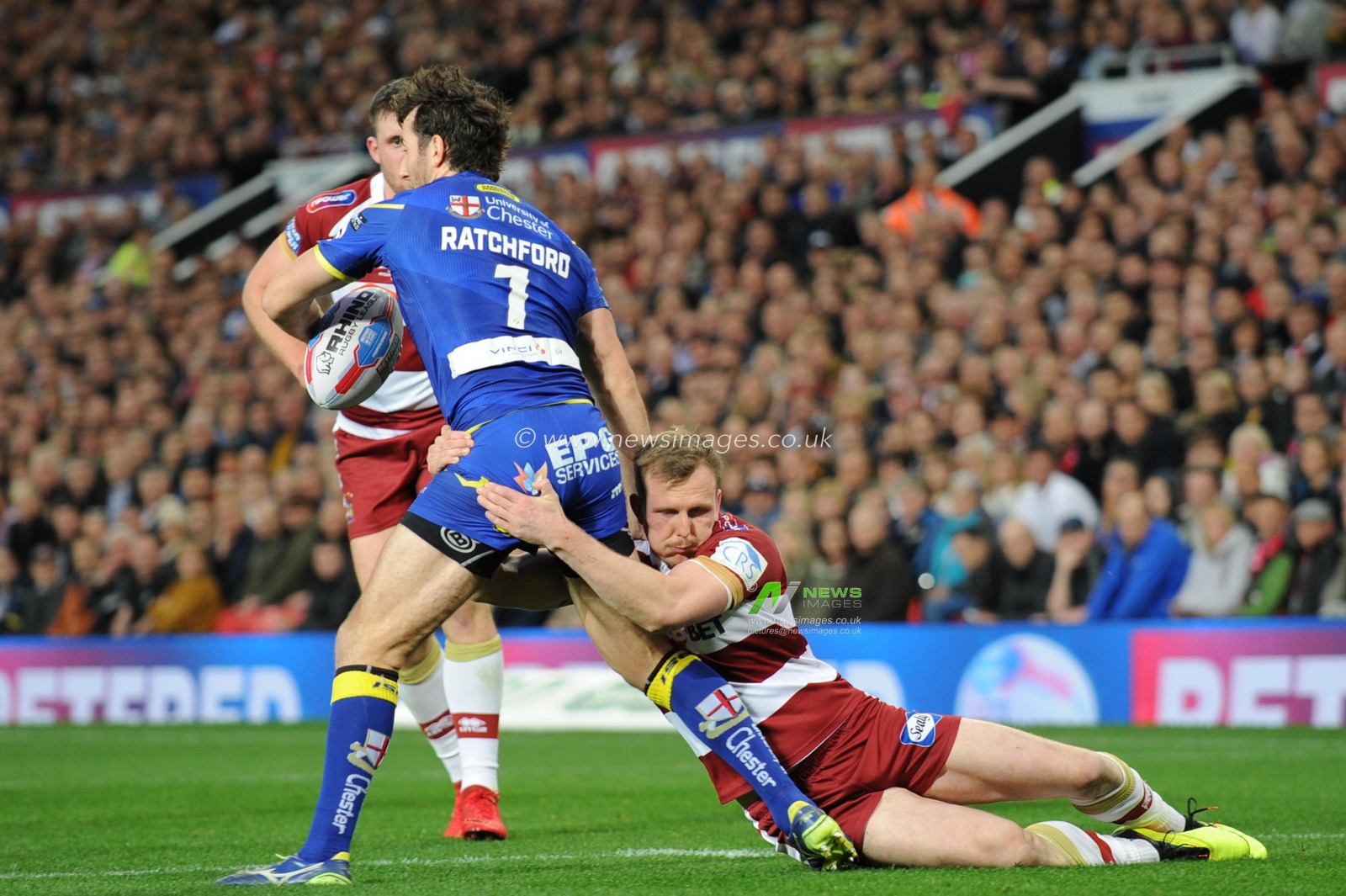 13th October 2018 , Old Trafford,  Manchester, England;  Betfred Super League Grand Final, Wigan Warriors v Warrington Wolves; Dan Sarginson of Wigan Warriors tackles Stefan Ratchford of Warrington Wolves 


Credit: Richard Long/News Images