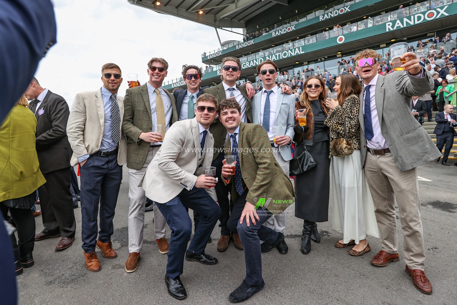 Racegoers enjoy the atmosphere during the The Randox Grand National 2024 Ladies Day at Aintree Racecourse, Liverpool, United Kingdom, 12th April 2024

(Photo by Mark Cosgrove/News Images)
