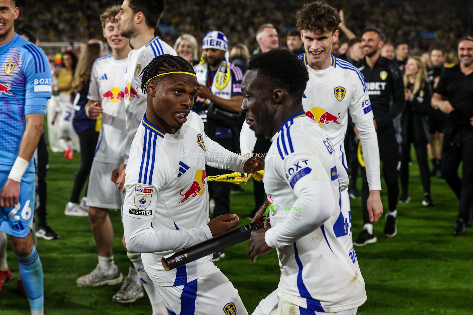 Largie Ramazani of Leeds United and Wilfried Gnonto of Leeds United celebrate promotion to the Premier League after the Sky Bet Championship match Leeds United vs Bristol City at Elland Road, Leeds, United Kingdom, 28th April 2025

(Photo by Alfie Cosgrove/News Images)