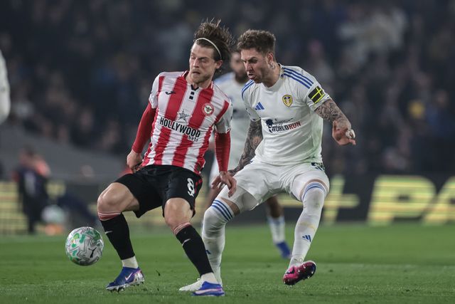 Mathias Jensen of Brentford holds Joe Rodon of Leeds United off the ball during the Premier League match Leeds United vs Brentford at Elland Road, Leeds, United Kingdom on 21 March 2026

(Photo by Mark Cosgrove/News Images)