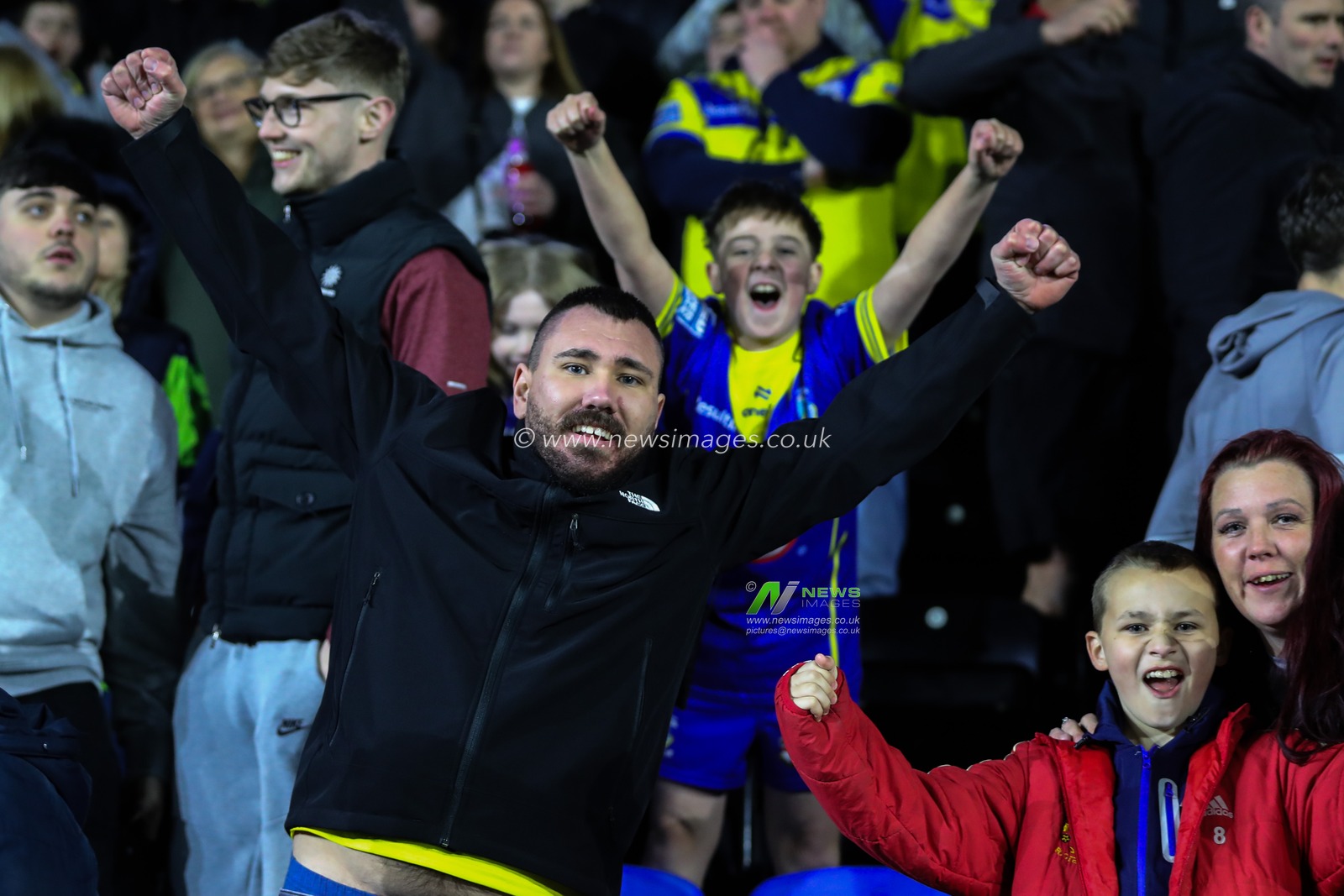 Warrington Wolves fans celebrate their teams win after the Betfred Challenge Cup match Widnes Vikings vs Warrington Wolves at DCBL Stadium, Widnes, United Kingdom, 15th March 2025

(Photo by Gareth Evans/News Images)