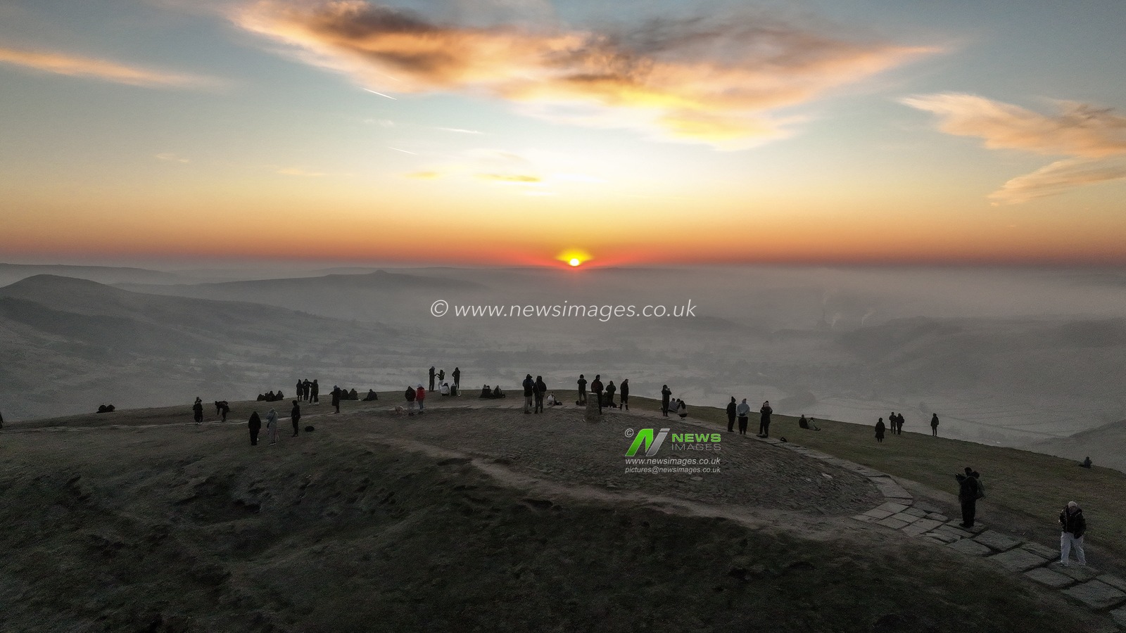 People head to the summit of Mam Tor to watch the sun rise as a blanket of fog lingers over the Hope Valley at Mam Tor, Peak District, United Kingdom, 19th March 2025

(Photo by Mark Cosgrove/News Images)