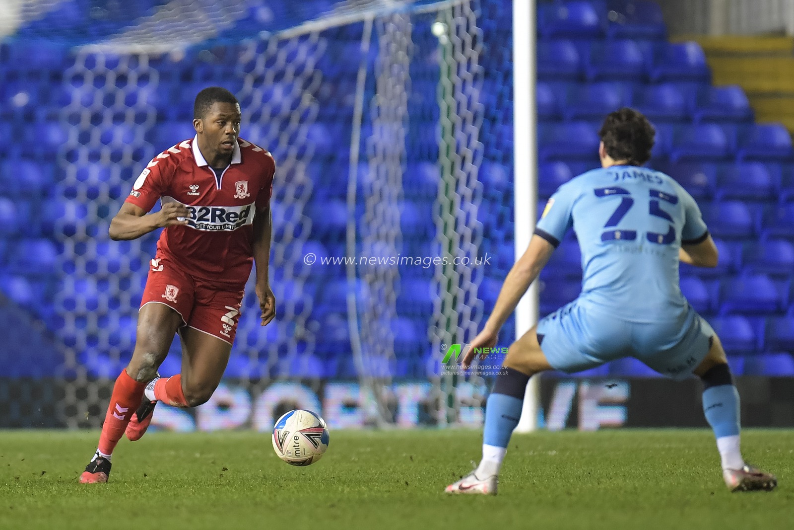Anfernee Dijksteel #2 of Middlesbrough looks for pass options under pressure from Matthew James #25 of Coventry City