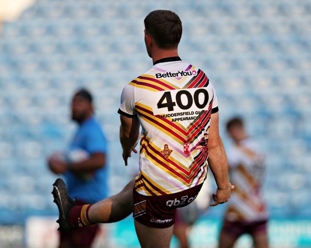 Leroy Cudjoe of Huddersfield Giants 400th game shirt before the Betfred Super League round 19 match Huddersfield Giants vs Wakefield Trinity at the Accu Stadium, Huddersfield, United Kingdom, 18th July 2025

(Photo by Sam Eaden/News Images)
