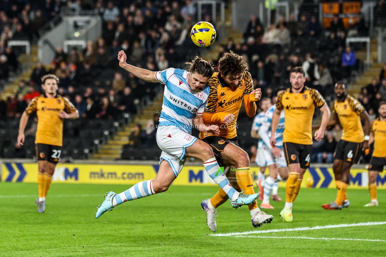 George Dobson of Wrexham and Matt Crooks of Hull City battle for the ball during the Sky Bet Championship match Hull City vs Wrexham at MKM Stadium, Hull, United Kingdom, 10th December 2025

(Photo by Alfie Cosgrove/News Images)

*** GER AUT SUI OUT ***