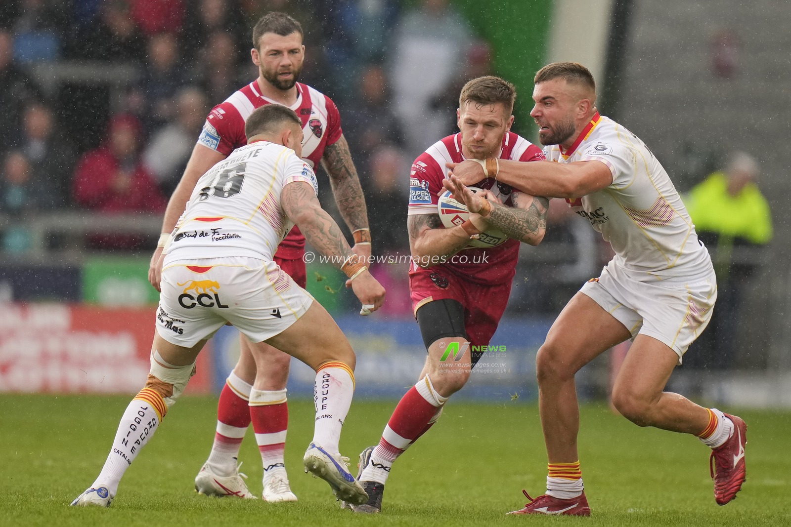 Marc Sneyd #7 of Salford Red Devils is held during the Betfred Super League Round 10 match Salford Red Devils vs Catalans Dragons at AJ Bell Stadium, Eccles, United Kingdom, 23rd April 2023

(Photo by Steve Flynn/News Images)