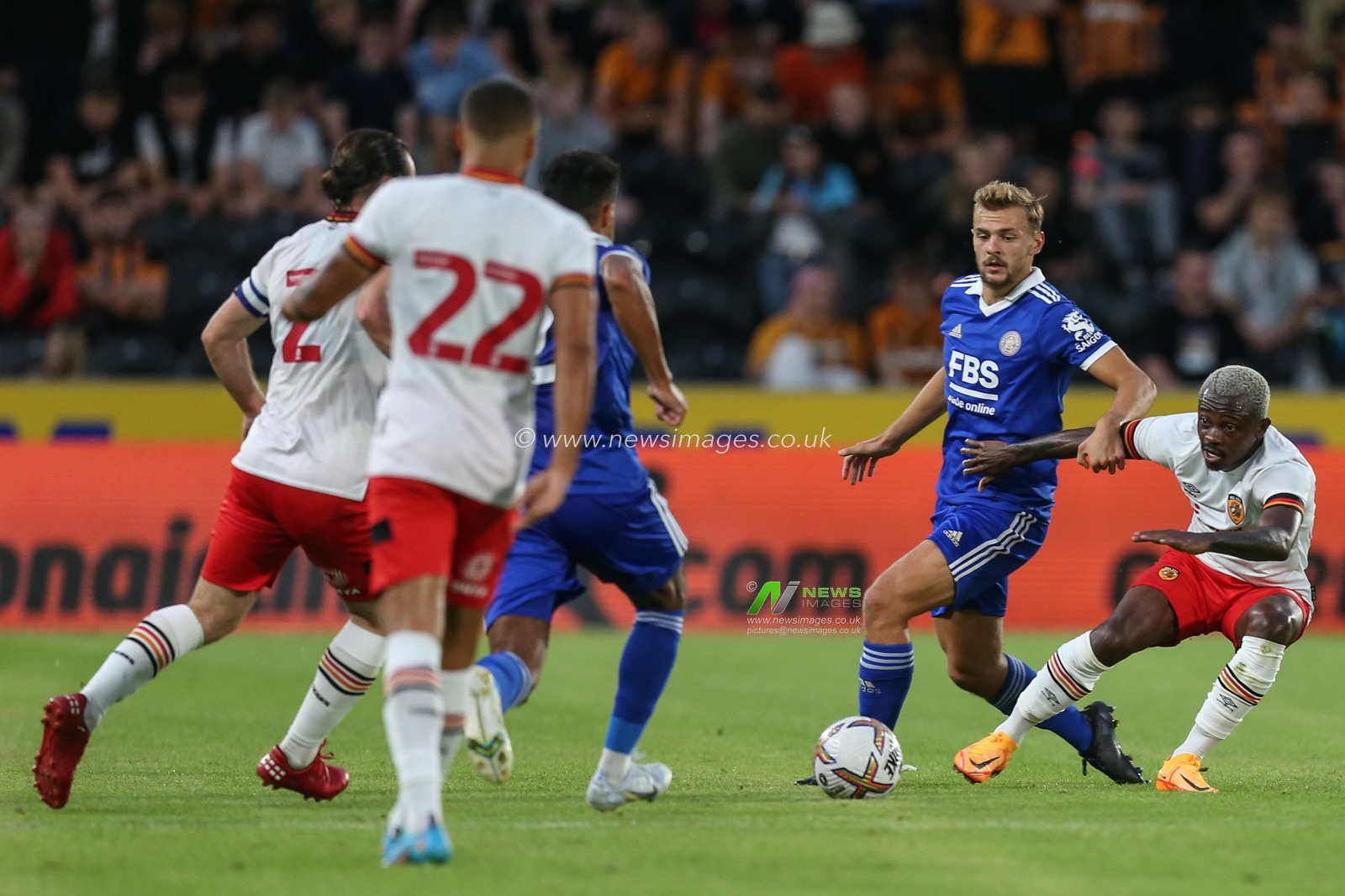 Jean MichaÃ«l Seri #24 of Hull City challenges for the ball