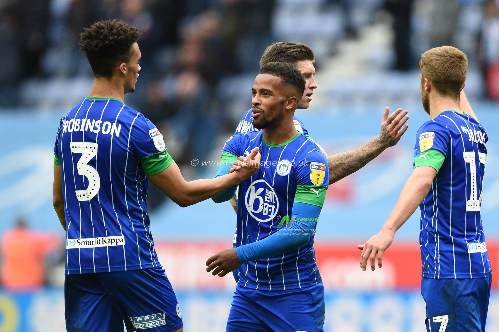 20th October 2019, DW Stadium, Wigan, England; Sky Bet Championship, Wigan Athletic v Nottingham Forest : Nathan Byrne (2) of Wigan Athletic and Antonee Robinson (3) of Wigan Athletic celebrate the victory

Credit: Richard Long/News Images