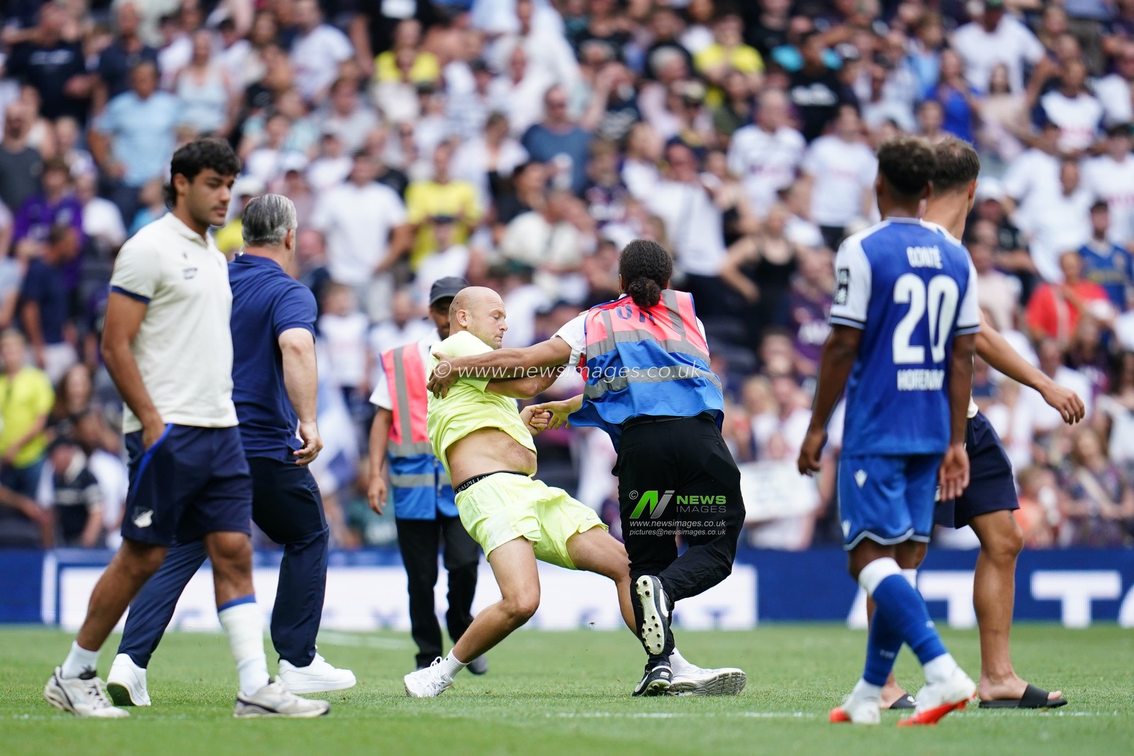 Pitch invader is taken out after running onto field of play during the pre-season friendly match Tottenham Hotspur vs Hoffenheim at Tottenham Hotspur Stadium, London, United Kingdom on 15 August 2026

(Photo by Harvey Murphy/News Images)