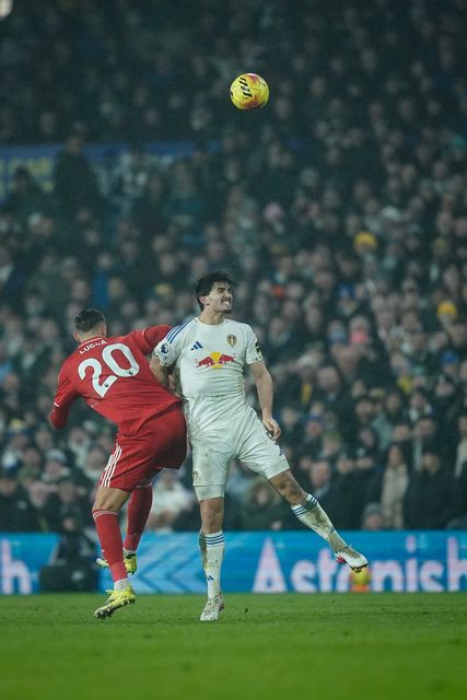 Pascal Struijk of Leeds United head the ball away under challenge from Lorenzo Lucca of Nottingham Forest during the Premier League match Leeds United vs Nottingham Forest at Elland Road, Leeds, United Kingdom on 06 February 2026

(Photo by Maynard Manyowa/News Images)