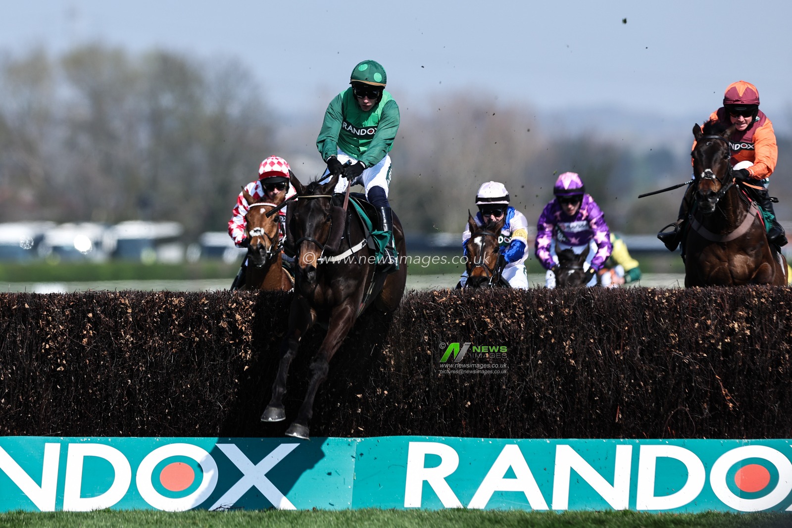Impaire Et Passe ridden by Paul Townend takes the lead over the final fence during the Randox Grand National 2025 Day 1 Opening Day at Aintree Racecourse, Liverpool, United Kingdom, 3rd April 2025

(Photo by Mark Cosgrove/News Images)