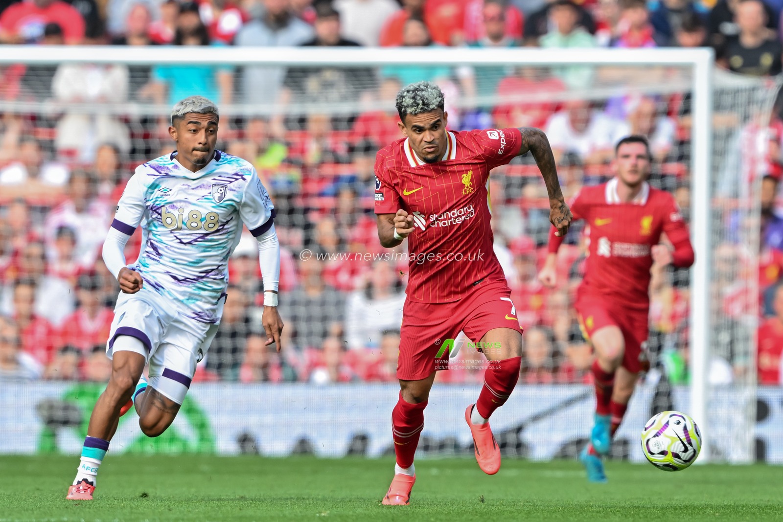 Luis DÃ­az of Liverpool breaks forwards with the ball during the Premier League match Liverpool vs Bournemouth at Anfield, Liverpool, United Kingdom, 21st September 2024

(Photo by Cody Froggatt/News Images)
