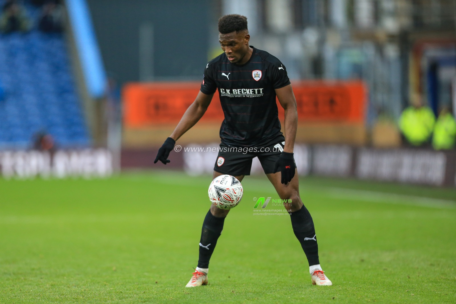 5th January 2019, Turf Moor, Burnley, England ; The Emirates FA Cup, 3rd Round, Burnley vs Barnsley : Dimitri Cavare (12) of Barnsley with the ball 

Credit: Mark Cosgrove/News Images

English Football League images are subject to DataCo Licence
