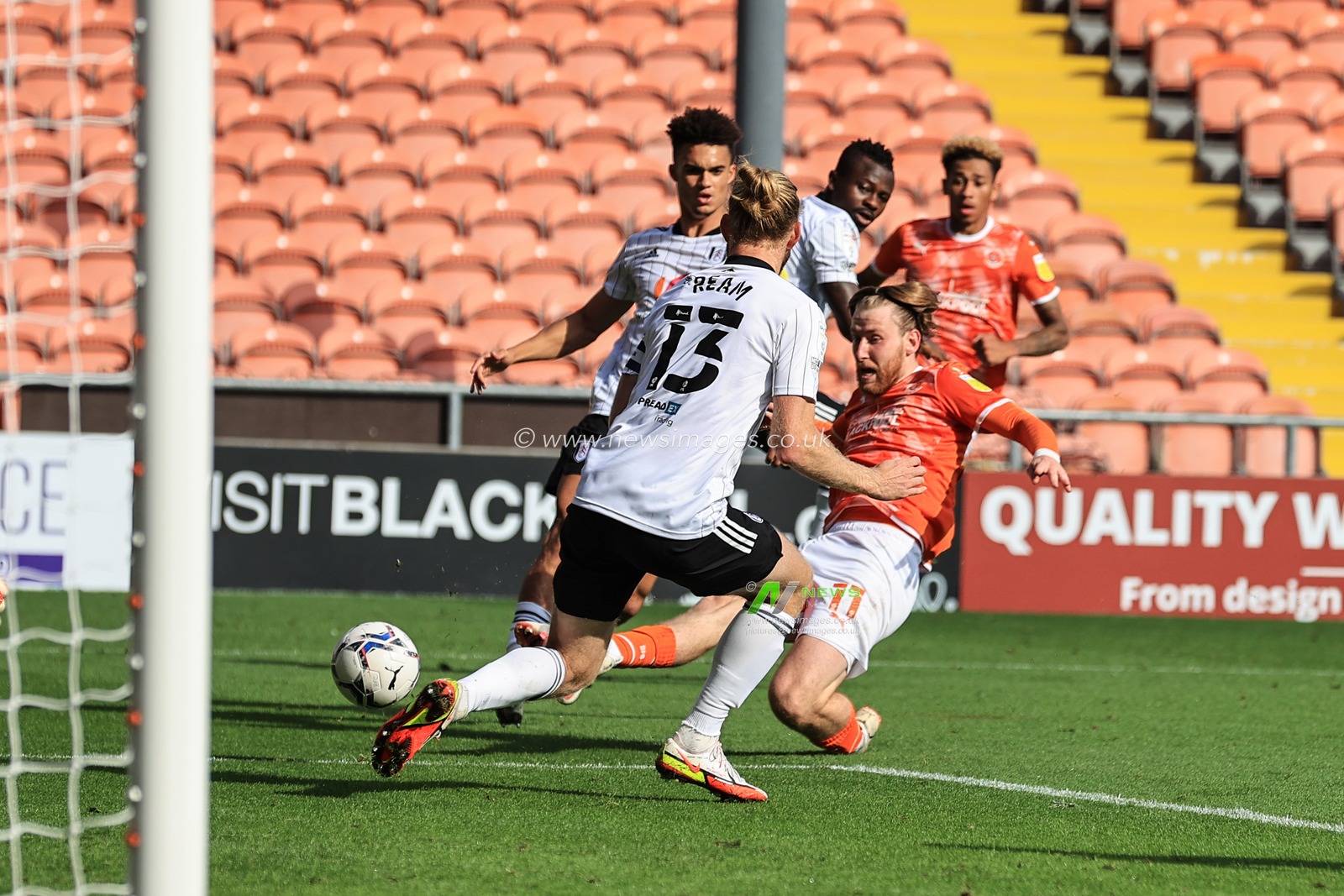 Josh Bowler #11 of Blackpool scores to make it 1-0