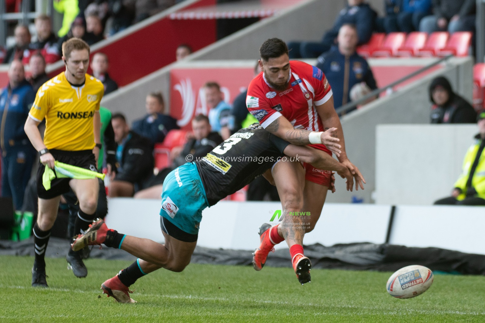 17th February 2019 ,  AJ Bell Stadium, Salford, England;  Betfred Super League, Round 10, Salford Red Devils vs Leeds Rhinos ; Kallum Watkins (3) of Leeds Rhinos puts Ken Sio (23) of Salford Red Devils in touch

Credit: Richard Long/News Images