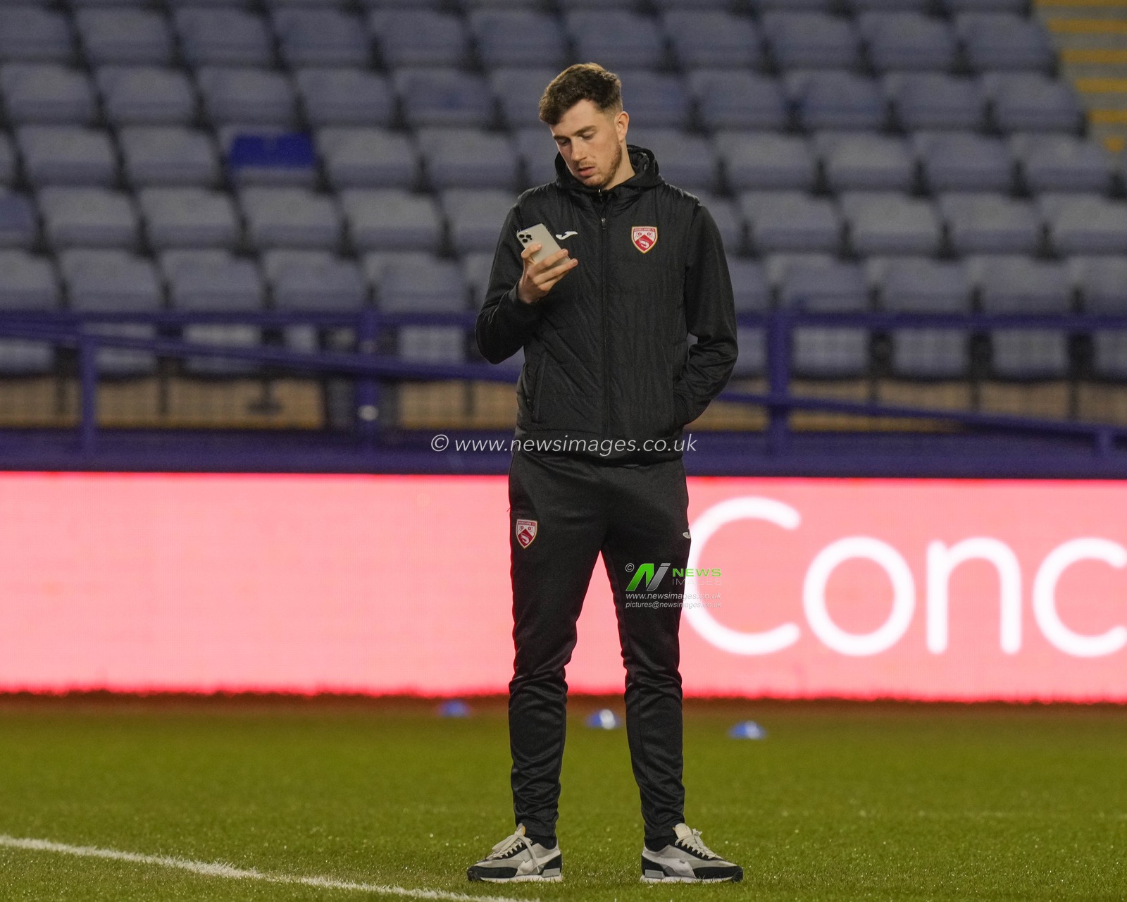 Jensen Weir #15 of Morecambe inspects the pitch before the Sky Bet League 1 match Sheffield Wednesday vs Morecambe at Hillsborough, Sheffield, United Kingdom, 14th February 2023

(Photo by Steve Flynn/News Images)