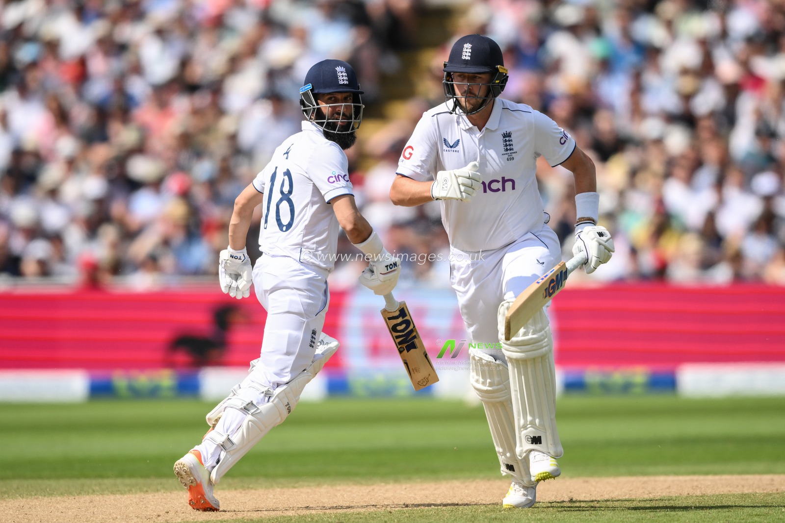 Ollie Robinson of England and Moeen Ali of England hit a quick single during the LV= Insurance Ashes Test Series Day 4 match England vs Australia at Edgbaston, Birmingham, United Kingdom, 19th June 2023

(Photo by Craig Thomas/News Images)